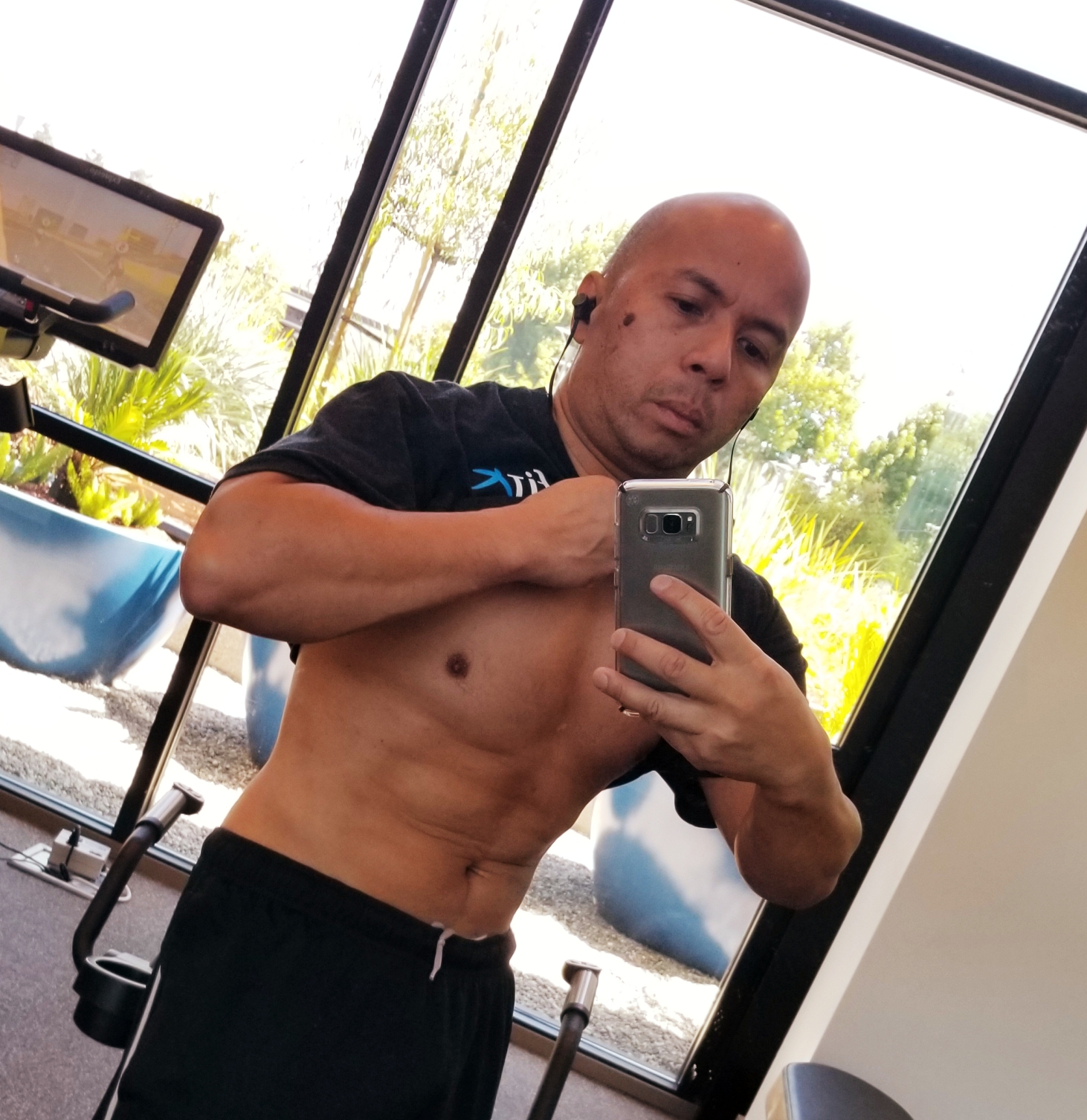 John Destacamento during physique training in 2017